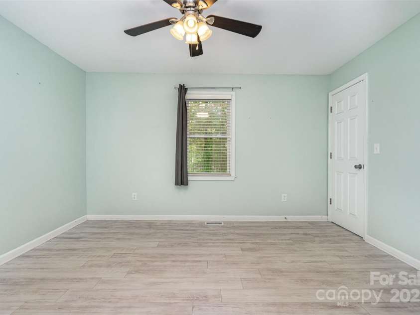 8107 Smith Road, Kannapolis, NC 28081.  MLS# CAR4276804, YatesRealty ID 25042. Primary Bedroom
