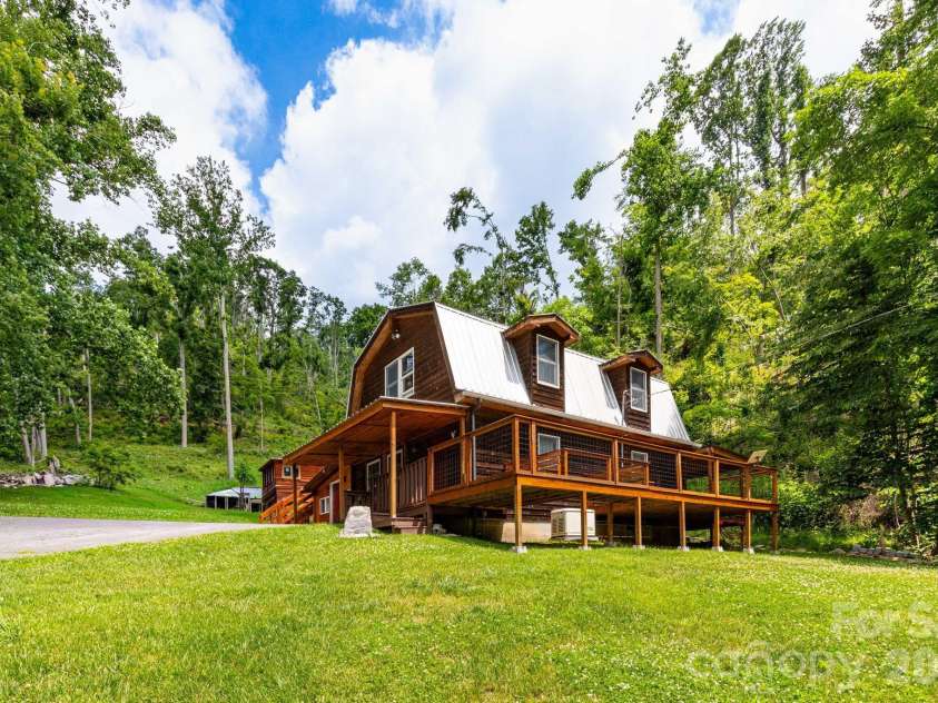1010 and 1014 Melton Branch Road, Bakersville, NC 28705.  MLS# CAR4333369, YatesRealty ID 25045. Barndominium Front