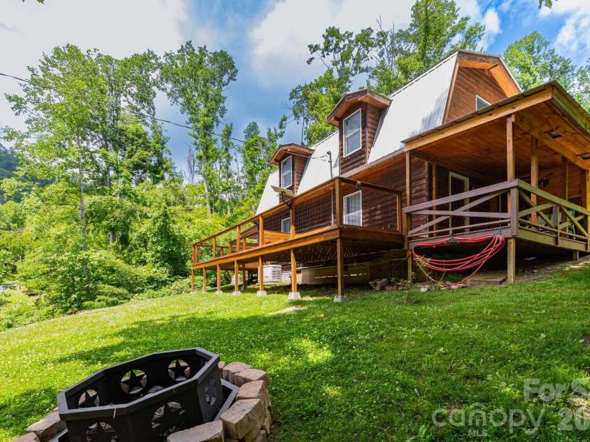 1010 and 1014 Melton Branch Road, Bakersville, NC 28705.  MLS# CAR4333369, YatesRealty ID 25045. Barndominium Yard