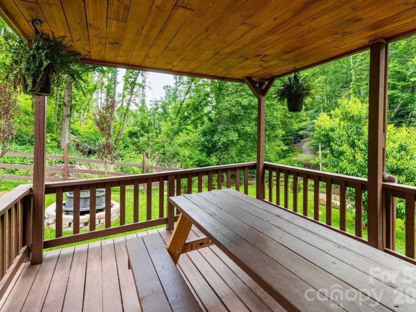 1010 and 1014 Melton Branch Road, Bakersville, NC 28705.  MLS# CAR4333369, YatesRealty ID 25045. Cabin Deck