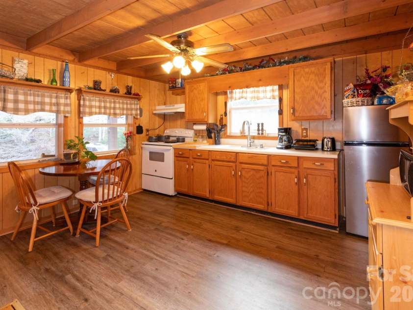 1010 and 1014 Melton Branch Road, Bakersville, NC 28705.  MLS# CAR4333369, YatesRealty ID 25045. Cabin Kitchen