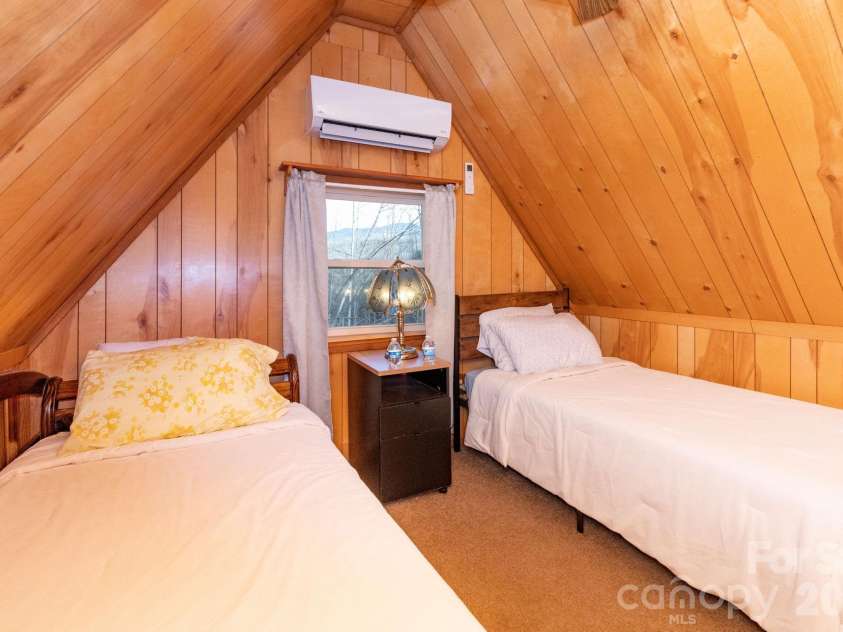 1010 and 1014 Melton Branch Road, Bakersville, NC 28705.  MLS# CAR4333369, YatesRealty ID 25045. Cabin Loft Sleeping Area 2