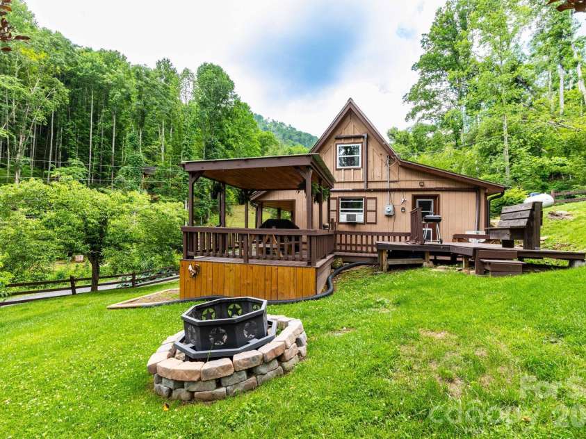 1010 and 1014 Melton Branch Road, Bakersville, NC 28705.  MLS# CAR4333369, YatesRealty ID 25045. Cabin Yard with Firepit