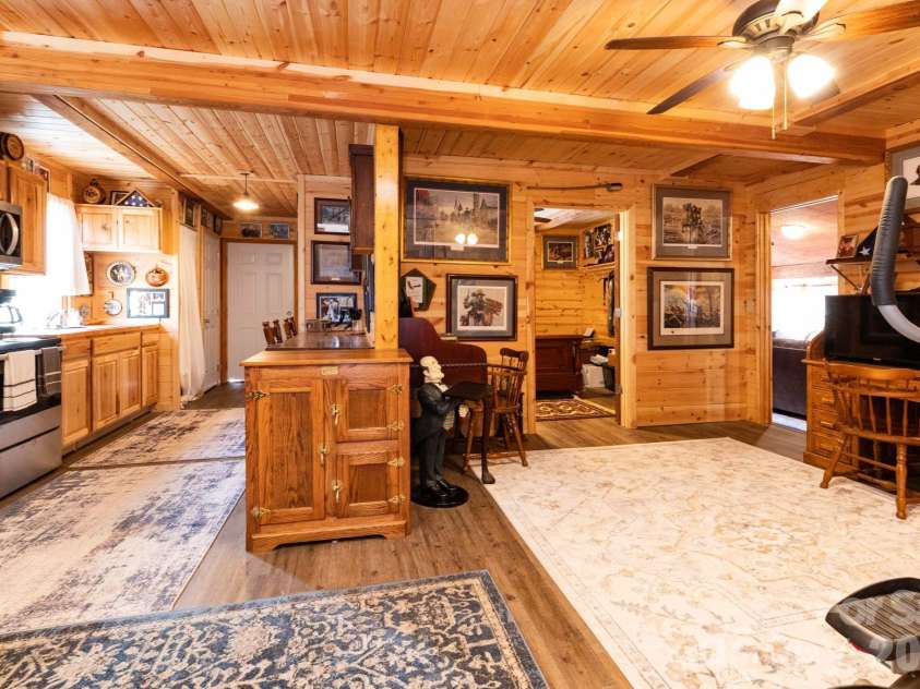 1010 and 1014 Melton Branch Road, Bakersville, NC 28705.  MLS# CAR4333369, YatesRealty ID 25045. Main Level Hall/Dining