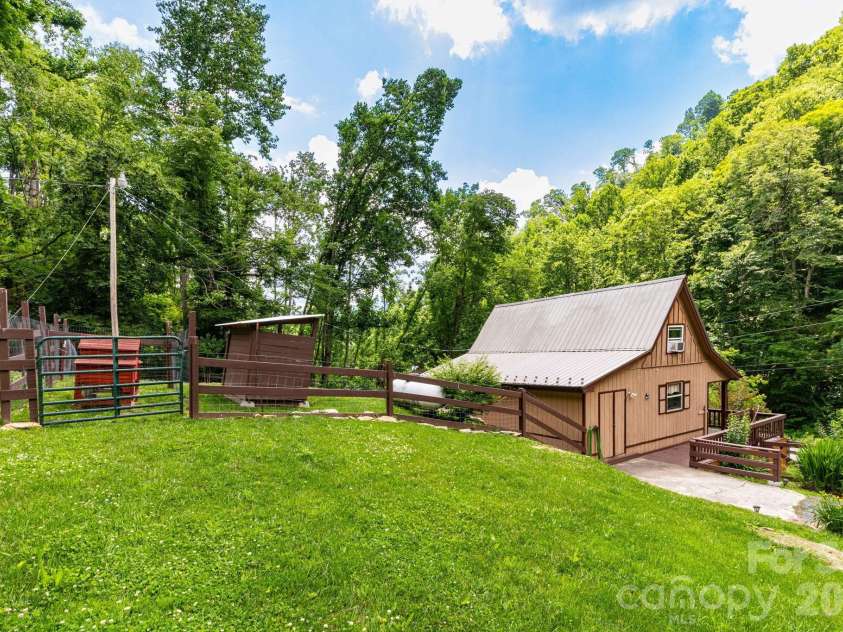 1010 and 1014 Melton Branch Road, Bakersville, NC 28705.  MLS# CAR4333369, YatesRealty ID 25045. Yard Between Homes