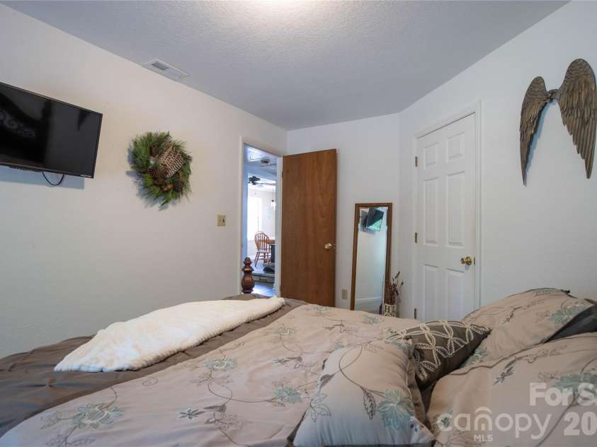 84 Sheets Farm Road, Bakersville, NC 28705.  MLS# CAR4384687, YatesRealty ID 25058. Down Stairs Bedroom