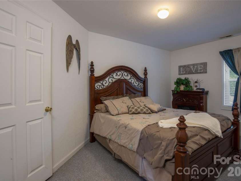 84 Sheets Farm Road, Bakersville, NC 28705.  MLS# CAR4384687, YatesRealty ID 25058. Down Stairs Bedrrom