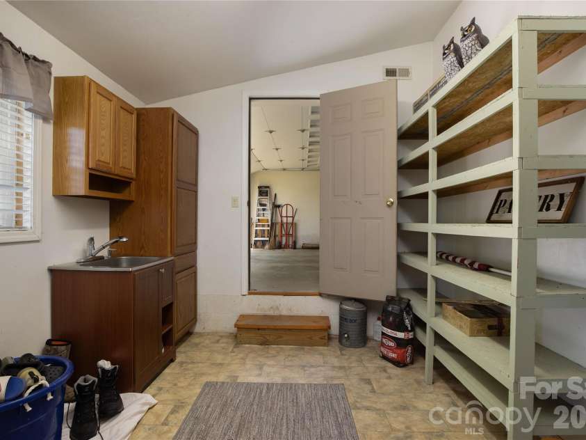 84 Sheets Farm Road, Bakersville, NC 28705.  MLS# CAR4384687, YatesRealty ID 25058. Mud/Utility Room
