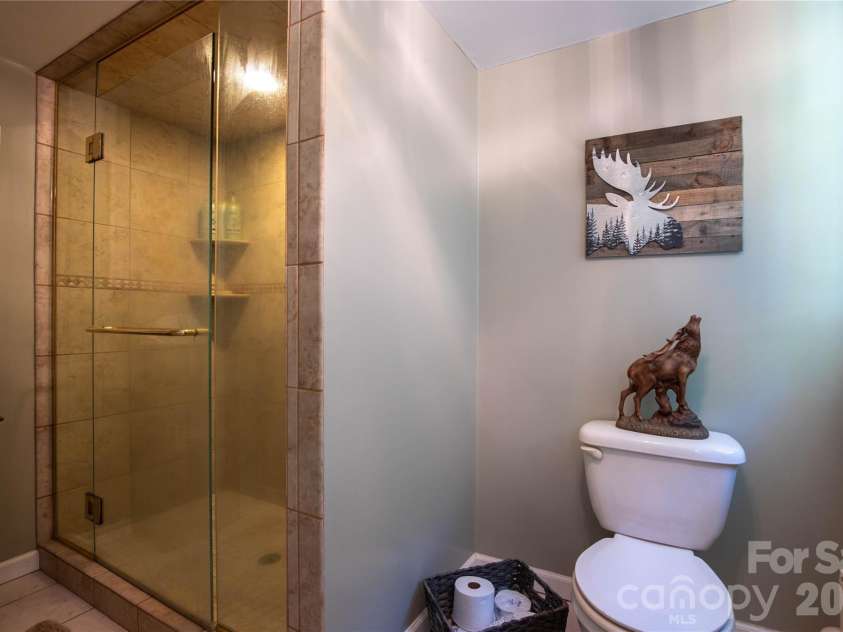 84 Sheets Farm Road, Bakersville, NC 28705.  MLS# CAR4384687, YatesRealty ID 25058. Primary Bathroom