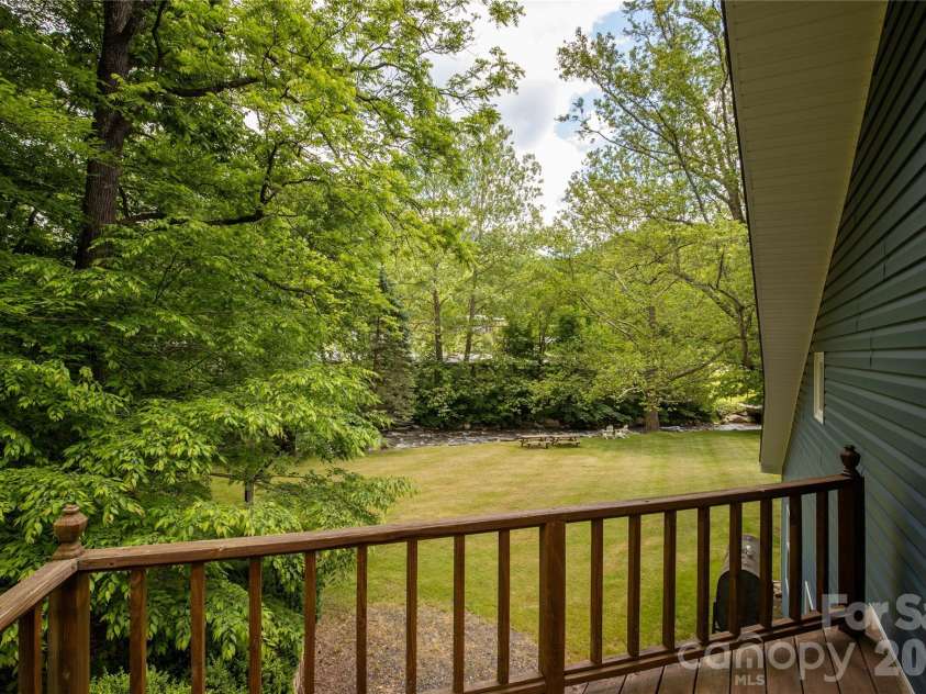 84 Sheets Farm Road, Bakersville, NC 28705.  MLS# CAR4384687, YatesRealty ID 25058. Primary Bedroom Balcony 