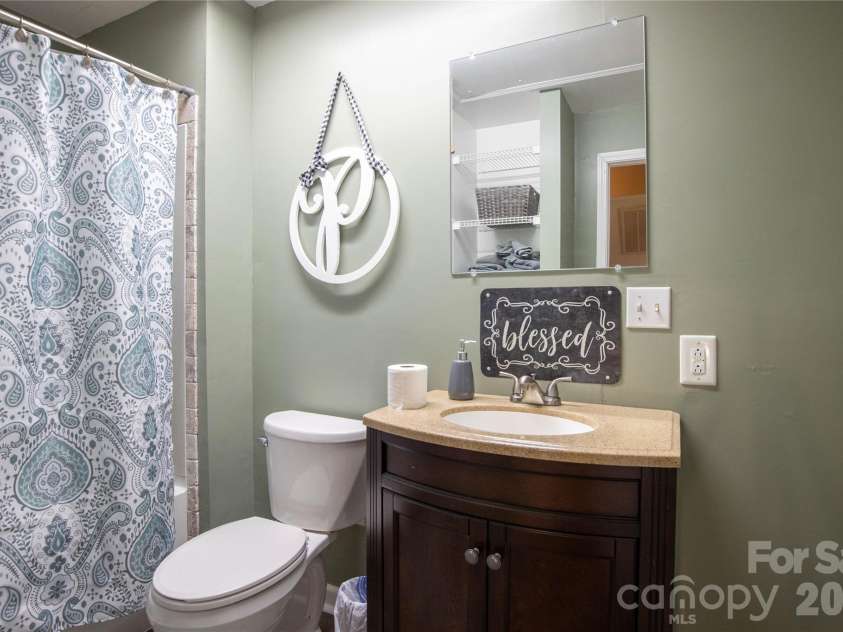 84 Sheets Farm Road, Bakersville, NC 28705.  MLS# CAR4384687, YatesRealty ID 25058. Upstairs bathroom