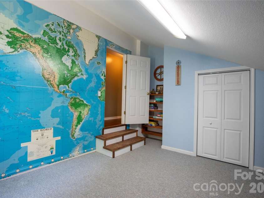 84 Sheets Farm Road, Bakersville, NC 28705.  MLS# CAR4384687, YatesRealty ID 25058. Upstairs Bedroom