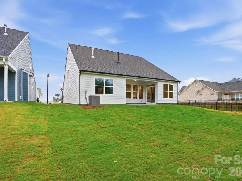 3062 Constitution Lane, Gastonia, NC 28056.  MLS# CAR4338163, YatesRealty ID 25059. Backyard on homesite 6