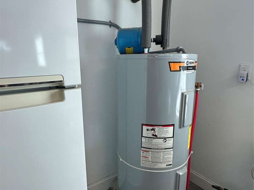 194 T R Harris Drive, Shelby, NC 28150.  MLS# CAR4277188, YatesRealty ID 25061. Water heater in garage