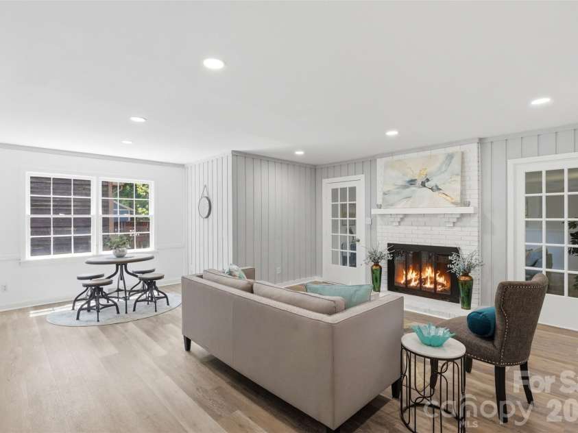 9624 Central Drive, Mint Hill, NC 28227.  MLS# CAR4385094, YatesRealty ID 25062. Living room fireplace centers the home and welcomes you to envision your holiday stockings hanging here!