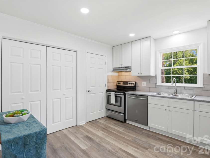 9624 Central Drive, Mint Hill, NC 28227.  MLS# CAR4385094, YatesRealty ID 25062. The laundry closet is conveniently located in this space, along with a nice pantry