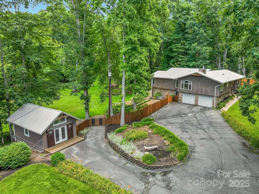 16 Due West Road, Hendersonville, NC 28792.  MLS# CAR4274720, YatesRealty ID 25064. Home 3.5 acres/enclosed back yard