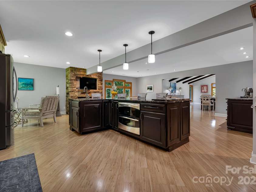 16 Due West Road, Hendersonville, NC 28792.  MLS# CAR4274720, YatesRealty ID 25064. Island w/veggie sink/oven