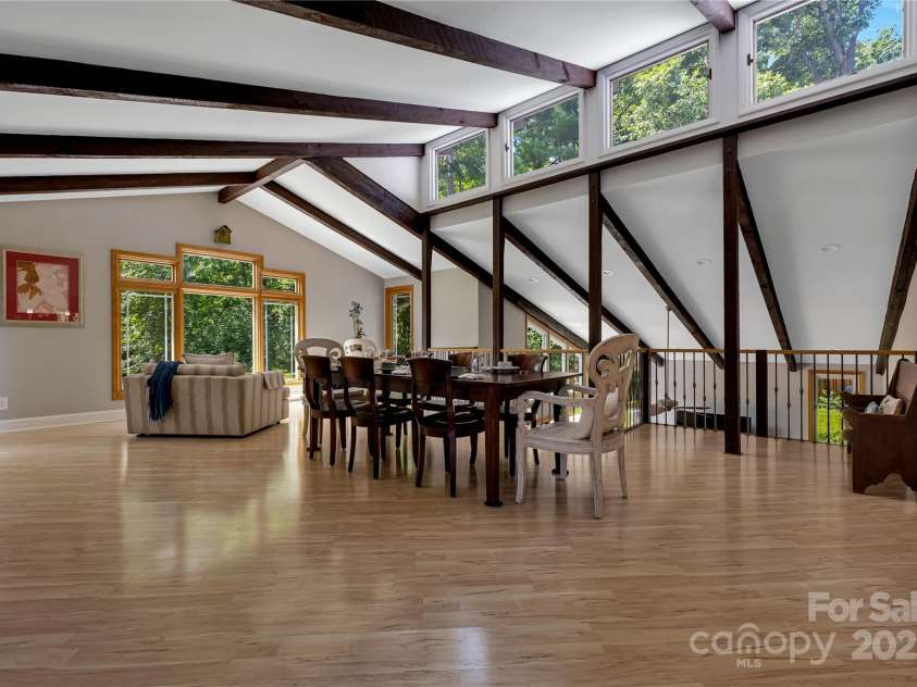 16 Due West Road, Hendersonville, NC 28792.  MLS# CAR4274720, YatesRealty ID 25064. Peaceful, light filled dining room
