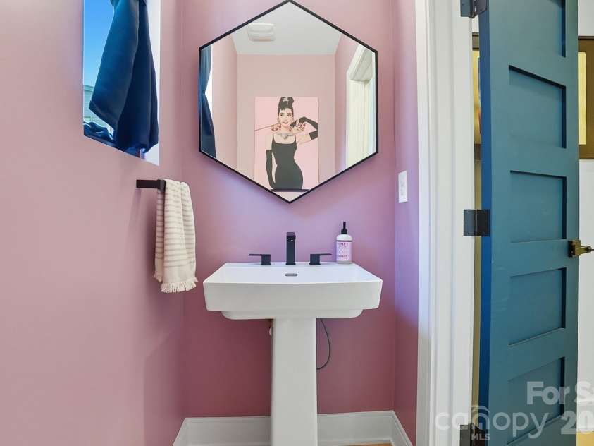 1003 Zinc Lane, Charlotte, NC 28205.  MLS# CAR4355110, YatesRealty ID 25065. Main level, half-bathroom