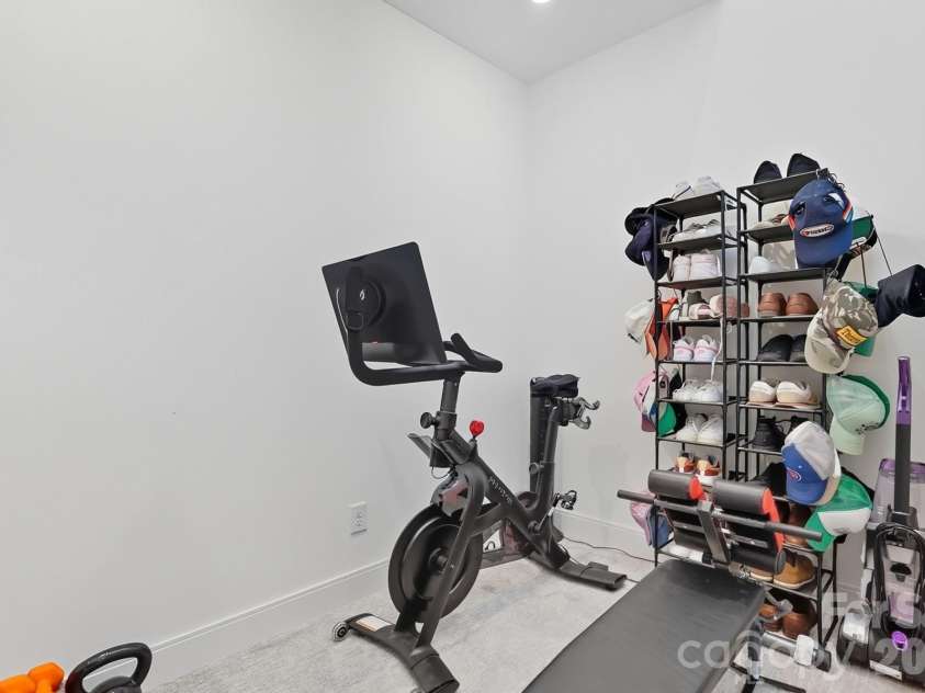 1003 Zinc Lane, Charlotte, NC 28205.  MLS# CAR4355110, YatesRealty ID 25065. Versatile upper level flex space: ideally suited for a private home office, workout space, or nursery. 