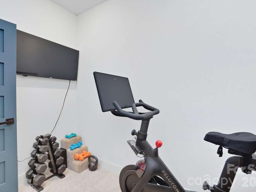 1003 Zinc Lane, Charlotte, NC 28205.  MLS# CAR4355110, YatesRealty ID 25065. Versatile upper level flex space: ideally suited for a private home office, workout space, or nursery. 