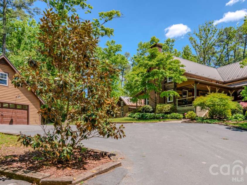 75 Old Gap Creek Road, Fairview, NC 28730.  MLS# CAR4378192, YatesRealty ID 25066. Complete view showing all the buildings
