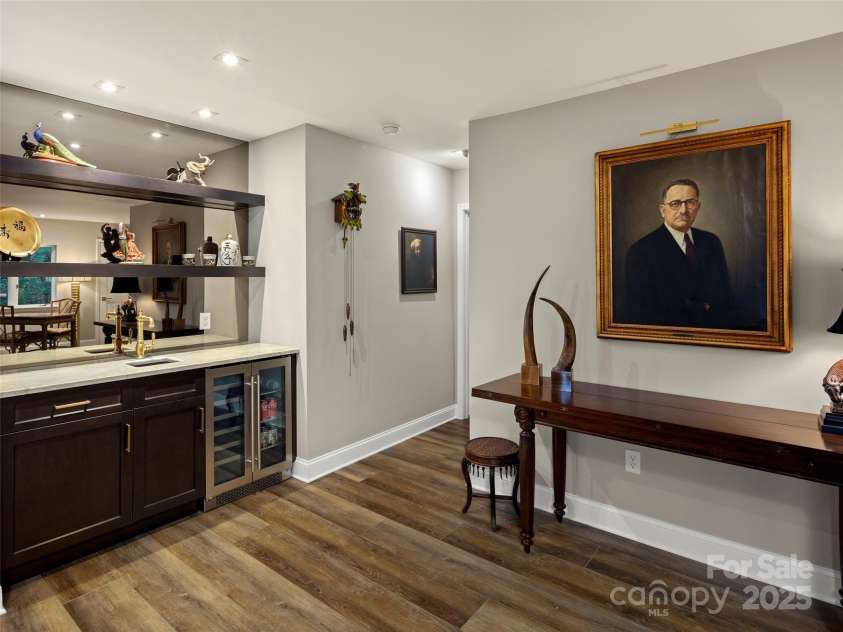 3301 Timber Trail, Asheville, NC 28804.  MLS# CAR4270898, YatesRealty ID 25068. Wet bar in lower level living room.