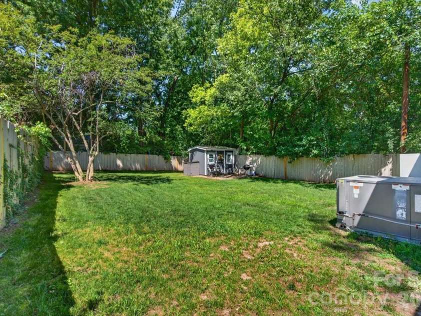 904 Academy Street, Charlotte, NC 28205.  MLS# CAR4380791, YatesRealty ID 25069. The deep, flat back yard is hard to come by in this part of Charlotte