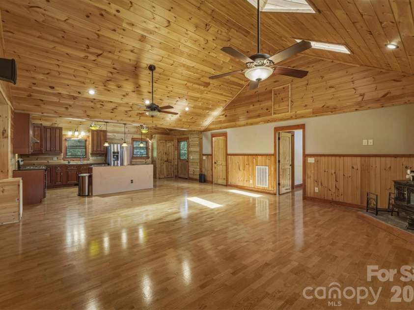732 Grandview Peaks Drive, Nebo, NC 28761.  MLS# CAR4379354, YatesRealty ID 25071. Great Room, Dining Area & Kitchen