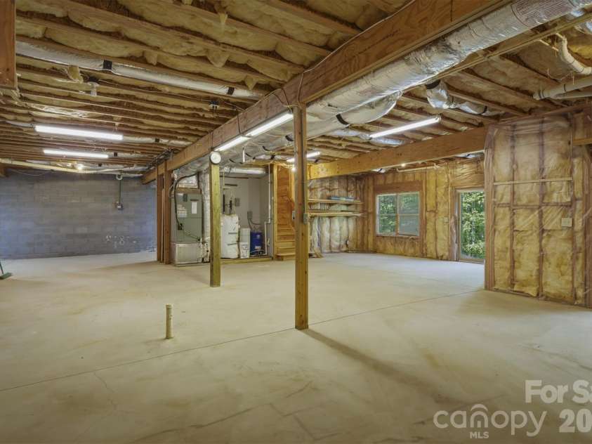 732 Grandview Peaks Drive, Nebo, NC 28761.  MLS# CAR4379354, YatesRealty ID 25071. Unfinished Basement