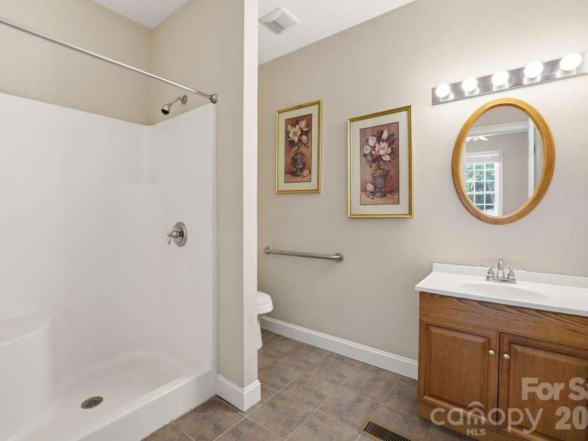 3285 Pleasant Road, Fort Mill, SC 29708.  MLS# CAR4372643, YatesRealty ID 25077. Connected Bath for in Law Suite