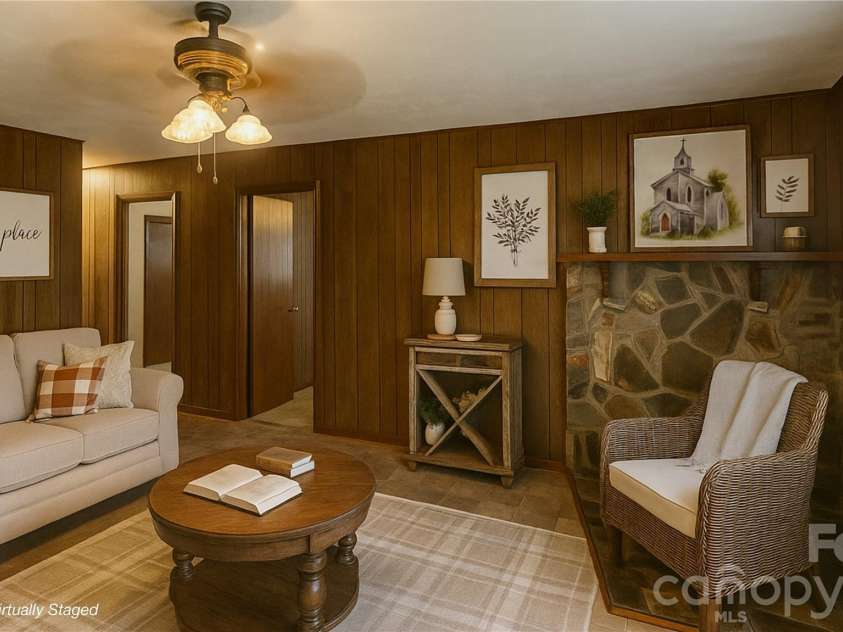560 Bailey Mountain Road, Mars Hill, NC 28754.  MLS# CAR4279232, YatesRealty ID 2508. Virtually staged living room to bring vision