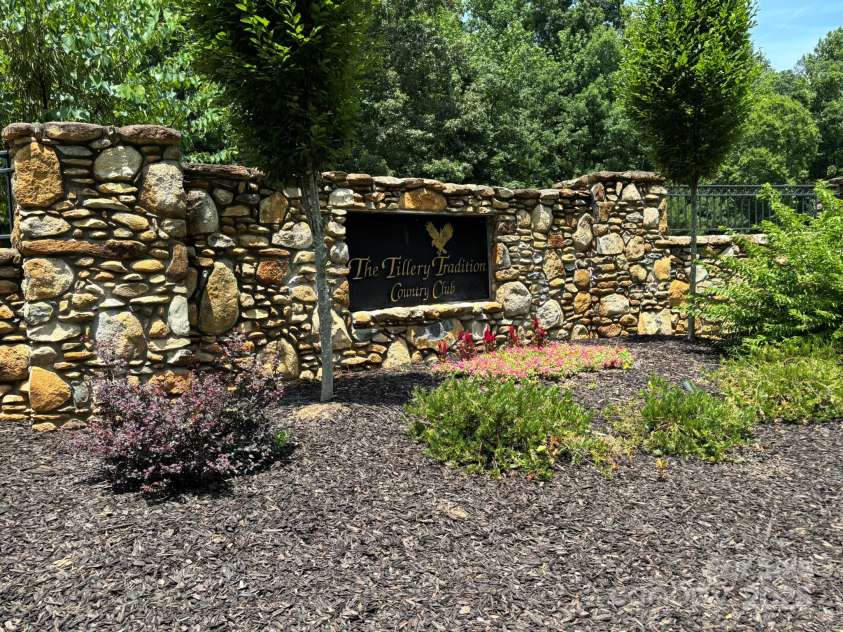 284 Old Harbor Drive, Mount Gilead, NC 27306.  MLS# CAR4272925, YatesRealty ID 25080. Street Sign for Tillery Tradition