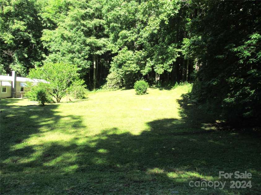 664 Woodfin Road, Sylva, NC 28779.  MLS# CAR4109164, YatesRealty ID 25082. 