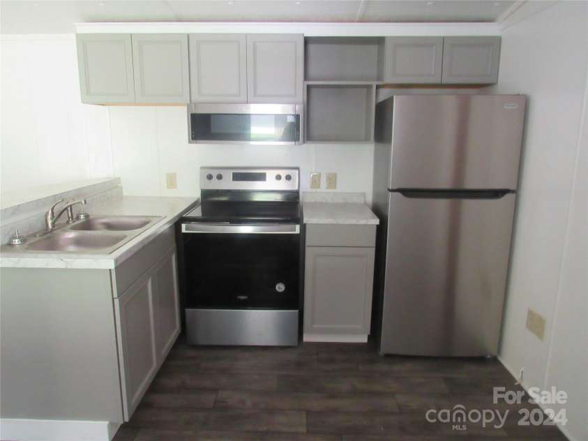 664 Woodfin Road, Sylva, NC 28779.  MLS# CAR4109164, YatesRealty ID 25082. 