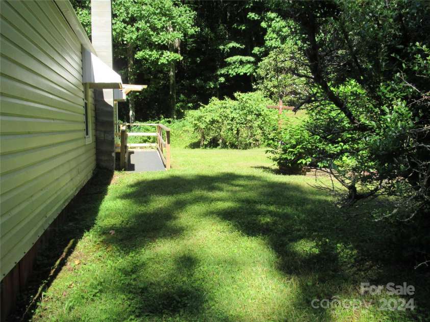 664 Woodfin Road, Sylva, NC 28779.  MLS# CAR4109164, YatesRealty ID 25082. 