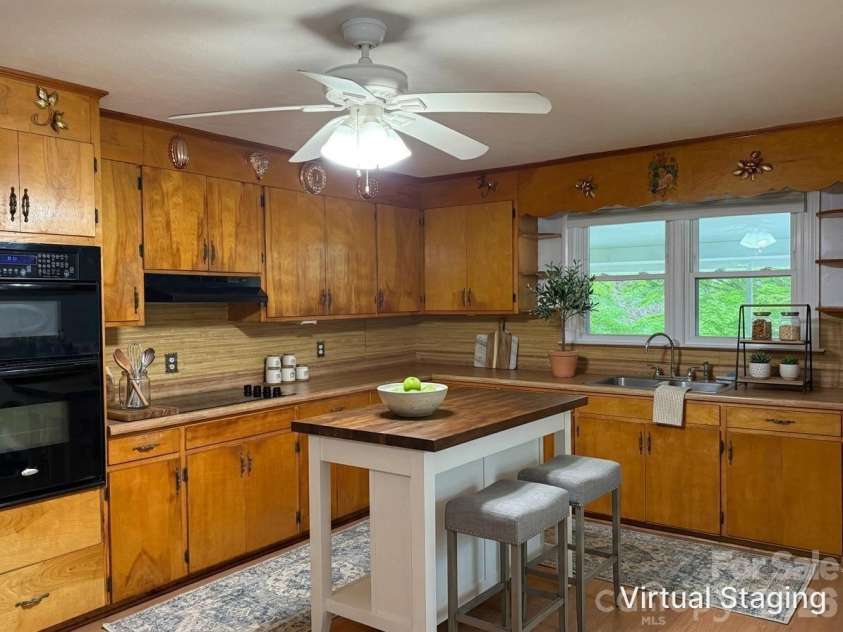 44 Tuttle Road, Hendersonville, NC 28792.  MLS# CAR4359823, YatesRealty ID 25084. Plenty of space to add an island (virtually staged)