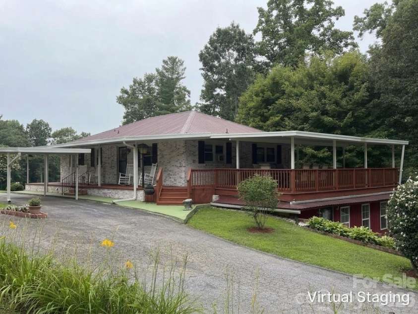 44 Tuttle Road, Hendersonville, NC 28792.  MLS# CAR4359823, YatesRealty ID 25084. Virtual Exterior Rendering: A visualization of how 44 Tuttle could look with a fresh exterior paint color.