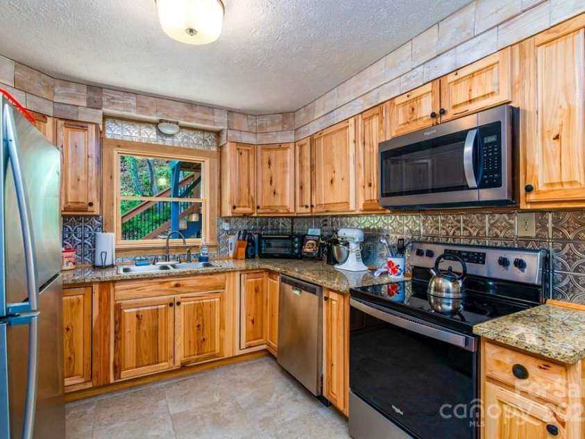 406 Poker Branch Road, Sylva, NC 28779.  MLS# CAR4260148, YatesRealty ID 25087. 