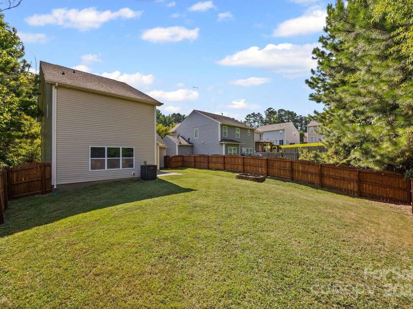 9706 Thyme Court, Charlotte, NC 28214.  MLS# CAR4277089, YatesRealty ID 25089. Massive Flat, Grassy, and Fully Fenced Backyard