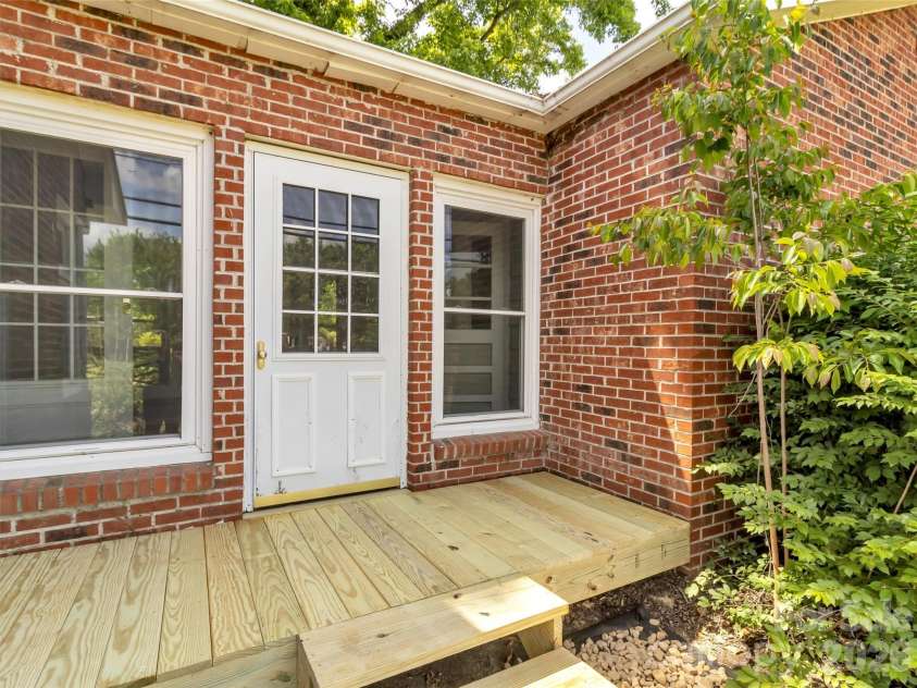 17 Hickory View Lane, Canton, NC 28716.  MLS# CAR4380208, YatesRealty ID 25090. Entry from front into sunroom