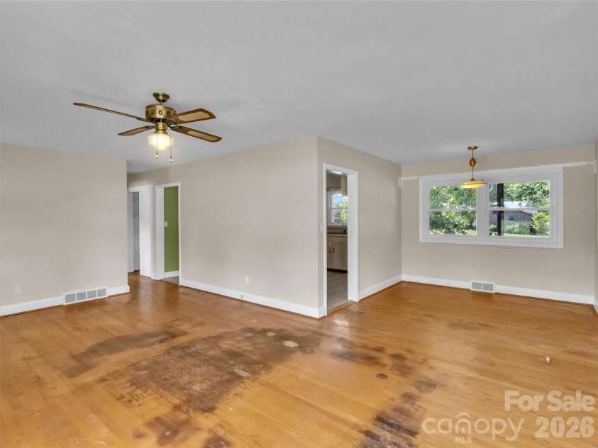 17 Hickory View Lane, Canton, NC 28716.  MLS# CAR4380208, YatesRealty ID 25090. Living room and dining area