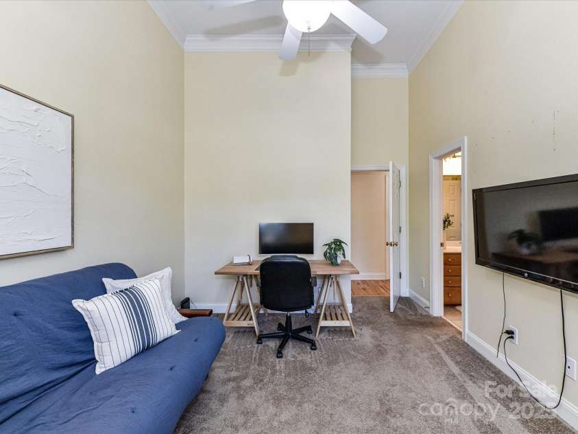 225 Northchase Drive, Concord, NC 28027.  MLS# CAR4314773, YatesRealty ID 25094. Bedroom 2 features crown molding, ceiling fan/light & Jack & Jill Bath!