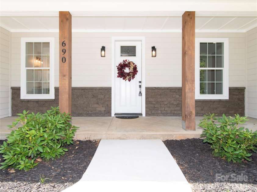 690 Settlers Trail, Mars Hill, NC 28754.  MLS# CAR4259983, YatesRealty ID 25096. Front Patio