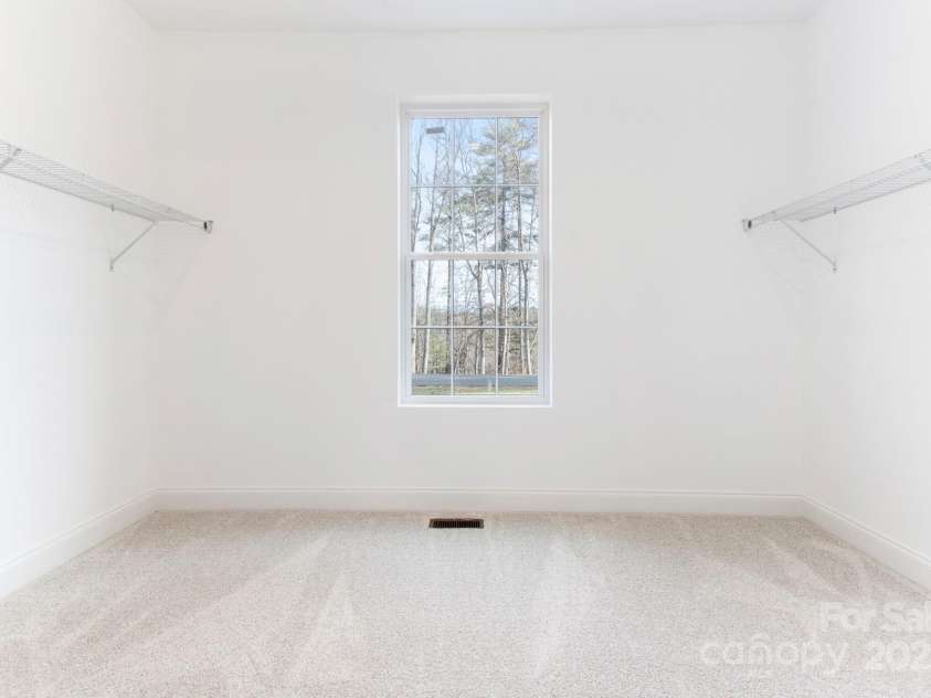 690 Settlers Trail, Mars Hill, NC 28754.  MLS# CAR4259983, YatesRealty ID 25096. Master Bedroom Walk-In Closet 10'x13'