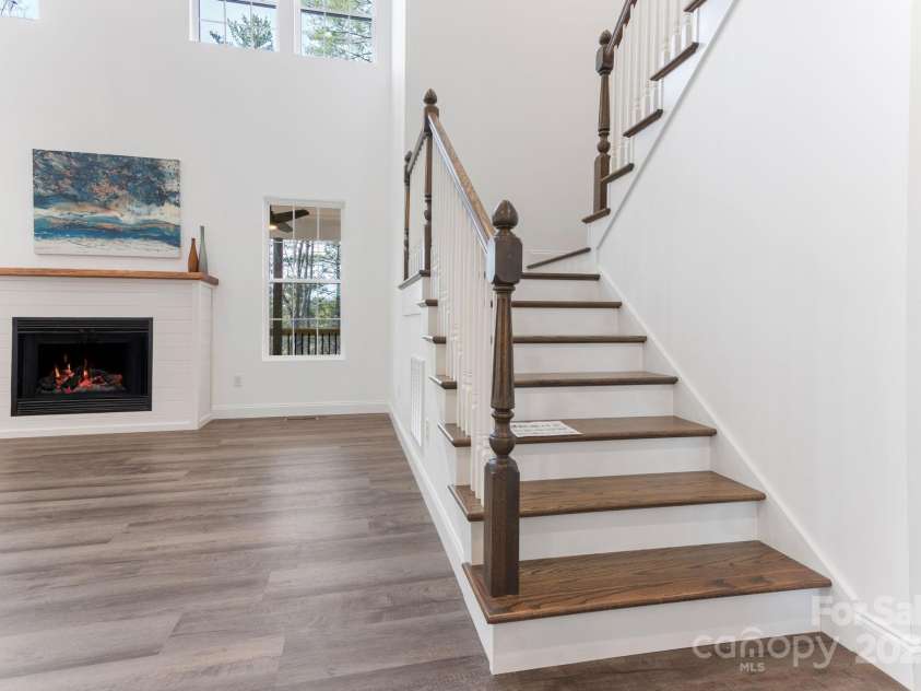 690 Settlers Trail, Mars Hill, NC 28754.  MLS# CAR4259983, YatesRealty ID 25096. Staircase to Upper Level