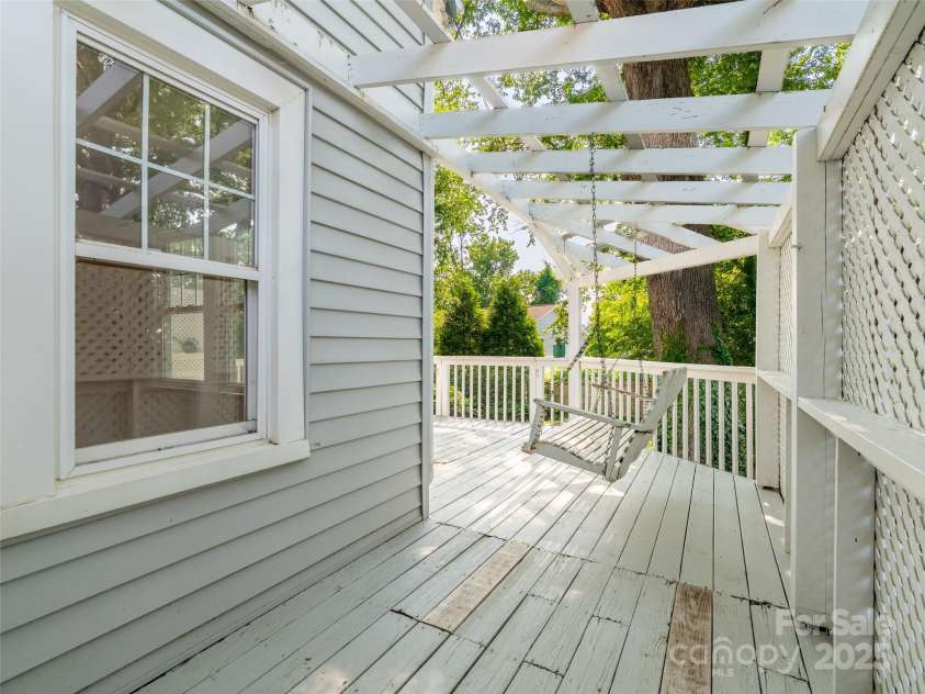 41 Princeton Drive, Asheville, NC 28806.  MLS# CAR4259252, YatesRealty ID 25100. Porch swing area