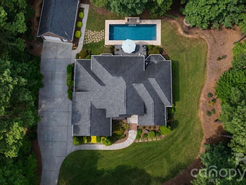 7282 James Court, Denver, NC 28037.  MLS# CAR4413144, YatesRealty ID 25100. AI Generated Pool.  Septic does allow for a pool.