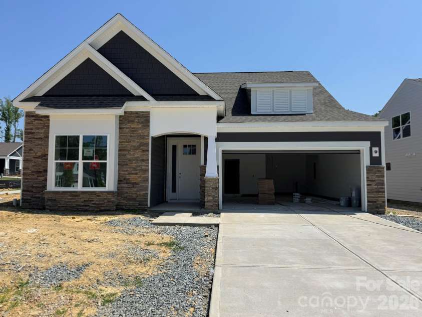 2046 Mantle Ridge Drive, Indian Trail, NC 28079.  MLS# CAR4378821, YatesRealty ID 25102. Construction progress of homesite 203